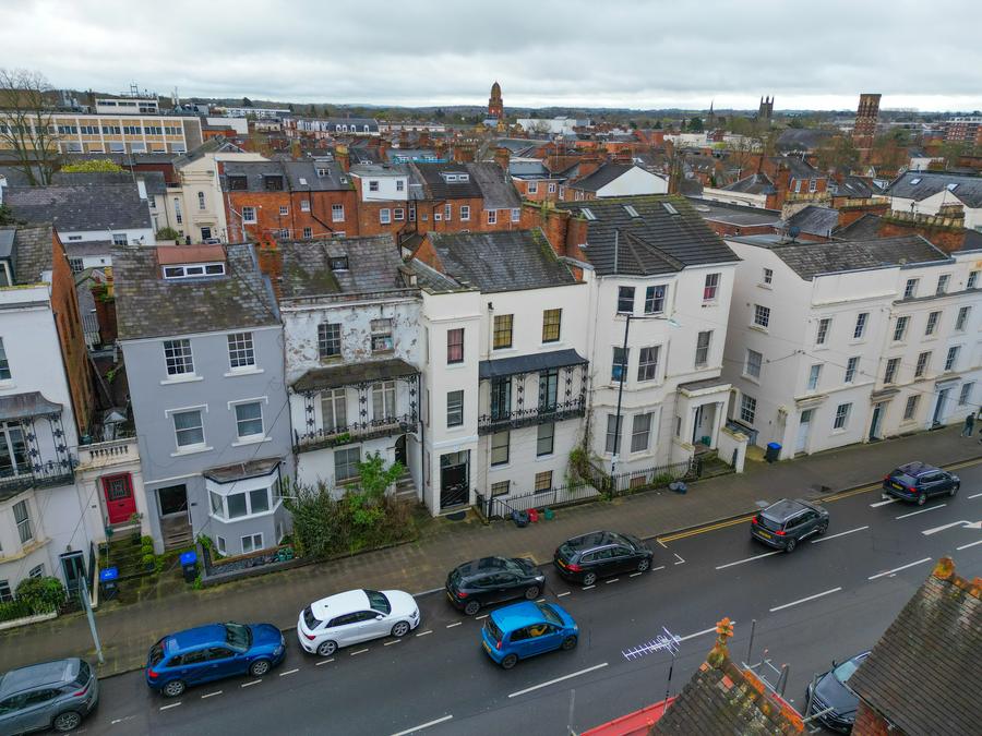 Georgian terrace along a town street, photographed from above the rooftops